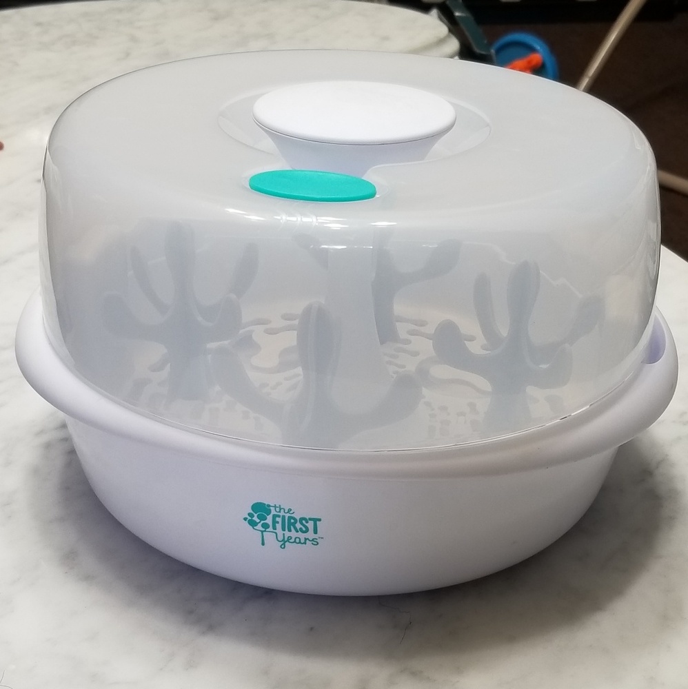 Bottle sterilizer and sound and projection system